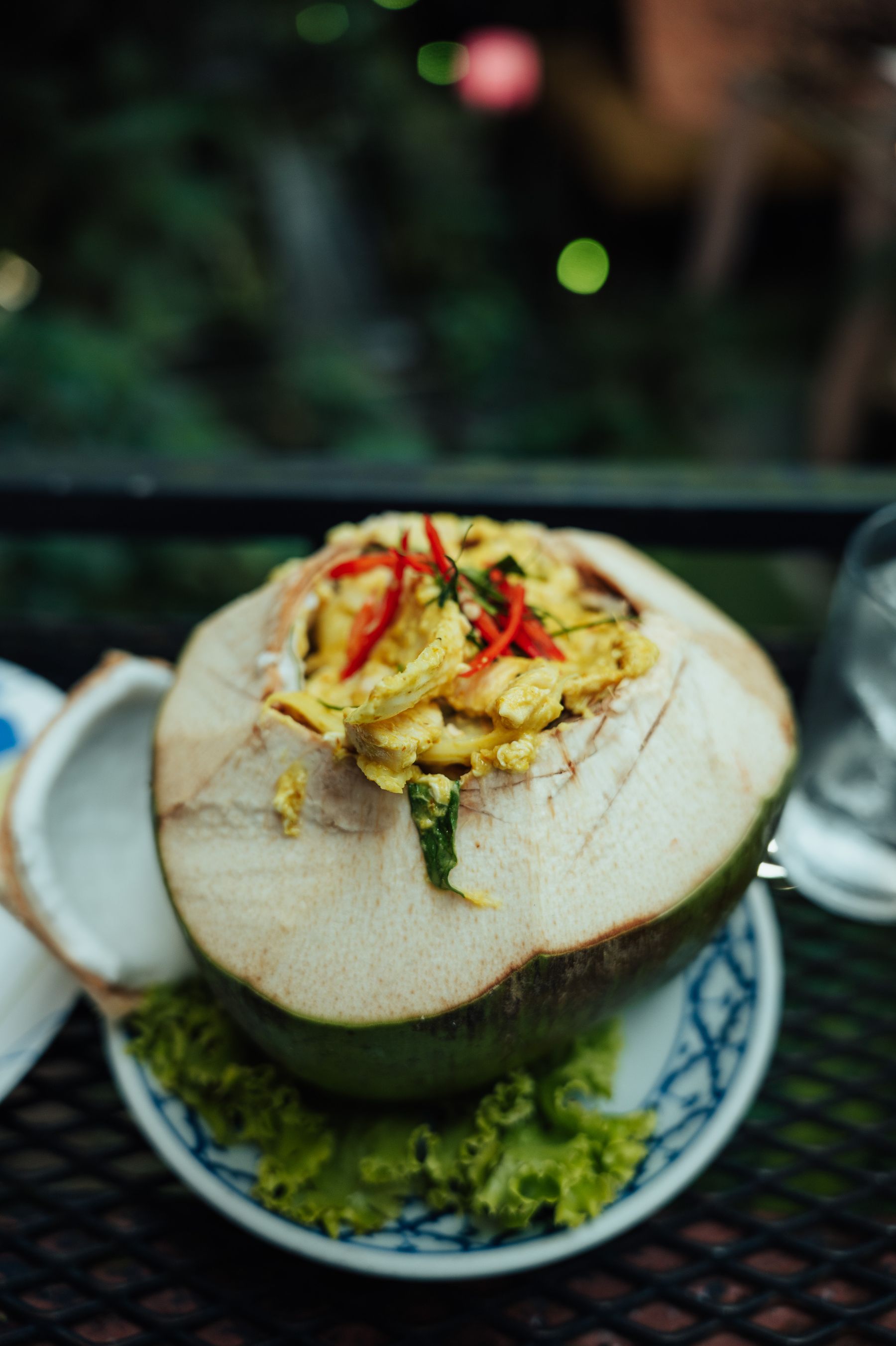 Thai curry served in a coconut shell